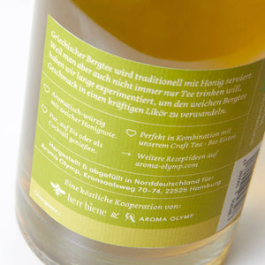 
                  
                    Aroma Olymp Bio Kräuterlikör "Sweet Hills" mit zugehörigem Etikett
                  
                